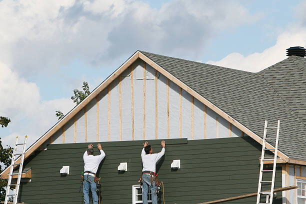 Professional Siding Contractor technician working in Eastover, NC